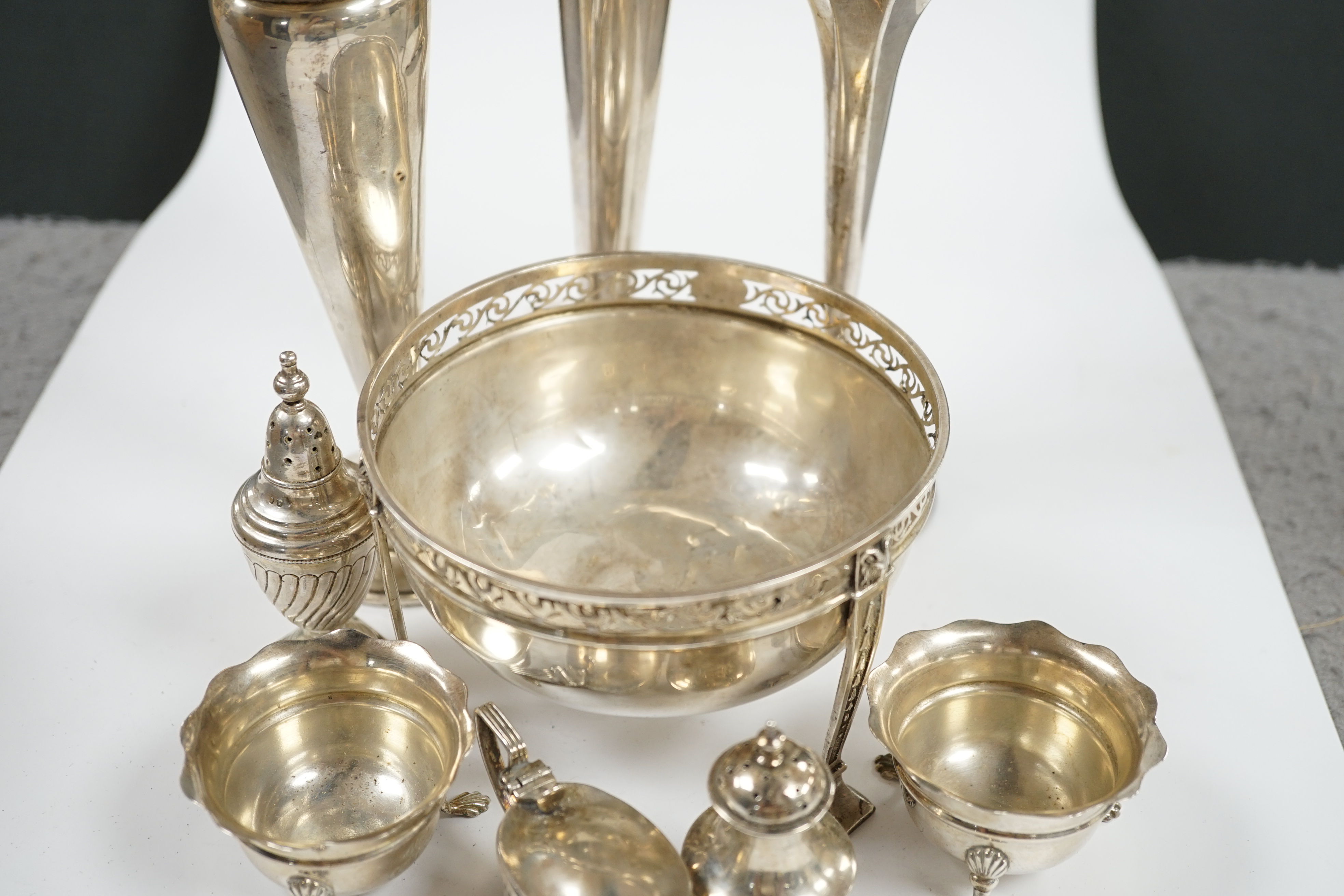 Three assorted silver mounted posy vases, tallest 20cm, five assorted silver condiments and a silver bowl. Condition - poor to fair